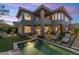 Stunning backyard with a pool, spa, and outdoor seating area; perfect for entertaining and relaxing at 6929 E Montreal Pl, Scottsdale, AZ 85254