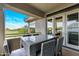 Relax on this covered balcony with great views of the lush golf course at 6929 E Montreal Pl, Scottsdale, AZ 85254