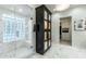 Spa bathroom with walk-in shower and closet, featuring marble and glass at 6929 E Montreal Pl, Scottsdale, AZ 85254
