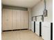 Clean garage features ample storage, closet, and Tesla power storage at 6929 E Montreal Pl, Scottsdale, AZ 85254