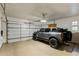 Spacious garage with epoxy floors and storage for your vehicles and equipment at 6929 E Montreal Pl, Scottsdale, AZ 85254