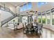 Expansive living and dining area with hardwood floors, high ceilings, and lots of natural light at 6929 E Montreal Pl, Scottsdale, AZ 85254