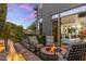 Outdoor patio with a water feature, fire pit, and seating, perfect for enjoying evenings at 6929 E Montreal Pl, Scottsdale, AZ 85254