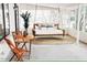 Relaxing porch with a swing, area rug, accent table, and chairs, perfect for lounging at 7412 S Elm St, Tempe, AZ 85283