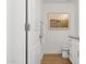 Bright bathroom with tile floors, granite countertops, and a striking print of a bison on the road at 7694 E Minnezona Ave, Scottsdale, AZ 85251