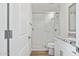 Bright bathroom with glass shower and granite countertops at 7694 E Minnezona Ave, Scottsdale, AZ 85251