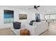 Bright living room with contemporary decor, comfortable seating, and stylish accents creates inviting atmosphere at 7694 E Minnezona Ave, Scottsdale, AZ 85251