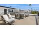 Rooftop deck with comfortable seating area for relaxing and entertaining, with scenic views at 7694 E Minnezona Ave, Scottsdale, AZ 85251