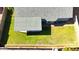 Aerial view of backyard with well-maintained lawn and covered patio at 8512 W Tuckey Ln, Glendale, AZ 85305
