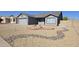 Charming single story home featuring low maintenance rock yard with mature landscaping at 8512 W Tuckey Ln, Glendale, AZ 85305
