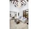 Bright living room with natural light, neutral-toned furnishings, and hardwood floors at 8601 N 59Th Pl, Paradise Valley, AZ 85253