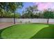 Backyard putting green with artificial turf, ideal for golf enthusiasts at 8601 N 59Th Pl, Paradise Valley, AZ 85253