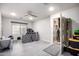 Versatile bonus room with plenty of space, natural light, and storage options at 9908 E Medina Ave, Mesa, AZ 85209
