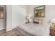 Cozy bedroom featuring a closet with sliding doors and an decorative landscape painting at 10713 N 124Th Pl, Scottsdale, AZ 85259