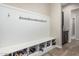 Functional mudroom with built-in bench, storage cubbies, and wall hooks for optimal organization at 10713 N 124Th Pl, Scottsdale, AZ 85259