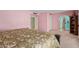 Spacious main bedroom featuring carpet flooring, neutral wall color, and access to the main bathroom and multiple closets at 1114 W Meseto Ave, Mesa, AZ 85210