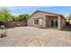 The backyard features a covered patio and low-maintenance gravel at 11351 N 153Rd Dr, Surprise, AZ 85379