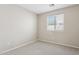 Comfortable bedroom with a bright window and plush carpeting at 11351 N 153Rd Dr, Surprise, AZ 85379