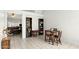 Open-concept dining and living space with tile flooring at 11925 N 67Th Dr, Peoria, AZ 85345