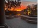 Elegant backyard with fire pit, spa, seating, and vibrant sunset views, ideal for outdoor living at 12749 E Poinsettia Dr, Scottsdale, AZ 85259