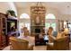 Inviting living room with stone fireplace, high ceilings, and neutral decor at 12749 E Poinsettia Dr, Scottsdale, AZ 85259