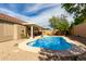 Lush backyard with a refreshing pool, perfect for entertaining and relaxation under the warm sun at 1425 E Darrel Rd, Phoenix, AZ 85042