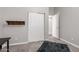 Small bedroom featuring neutral colors, carpet flooring, and closet at 1425 E Darrel Rd, Phoenix, AZ 85042