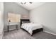 Bedroom with neutral walls, carpet flooring, ceiling fan, and window with blinds at 1425 E Darrel Rd, Phoenix, AZ 85042