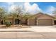 Charming single-story home featuring a two-car garage and well-maintained front yard at 1425 E Darrel Rd, Phoenix, AZ 85042