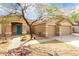 Inviting home with a well-manicured front yard and desert landscaping, showcasing charm and curb appeal at 1425 E Darrel Rd, Phoenix, AZ 85042