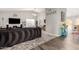 Open-concept living room with modern decor and seamless connection to the outdoors at 1425 E Darrel Rd, Phoenix, AZ 85042