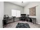 Home office featuring large desk, neutral colors, and carpet flooring at 1425 E Darrel Rd, Phoenix, AZ 85042