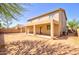 Spacious backyard with extended covered patio, perfect for outdoor living at 1524 N Milly Pl, Casa Grande, AZ 85122
