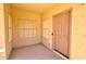Covered front entryway, featuring a light-colored door and protected from the elements at 1524 N Milly Pl, Casa Grande, AZ 85122