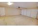 A spacious two-car garage with a motorized door and ample space for vehicles and storage at 1524 N Milly Pl, Casa Grande, AZ 85122