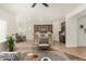 Open layout showcases a living room and kitchen with a cozy breakfast nook and bar stools at 15656 W Devonshire Ave, Goodyear, AZ 85395