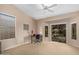 Bright bedroom features natural light, offering space for relaxation and personalization at 16151 W Fairmount Ave, Goodyear, AZ 85395