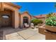Inviting outdoor patio featuring comfortable seating, ideal for relaxing and enjoying the beautiful weather at 16151 W Fairmount Ave, Goodyear, AZ 85395