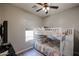 Neutral bedroom featuring bunk beds and a window providing plenty of natural light at 16511 W Cortez St, Surprise, AZ 85388