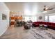 Spacious living area showcasing a seamless transition from the kitchen to the seating area at 16511 W Cortez St, Surprise, AZ 85388