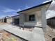 Contemporary one-story home featuring covered porch and visible construction at 17293 W Desert Sage Dr, Goodyear, AZ 85338