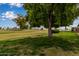 Picturesque backyard view onto the lush golf course at 18211 N Conestoga Dr, Sun City, AZ 85373