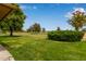 View of backyard and golf course at 18211 N Conestoga Dr, Sun City, AZ 85373