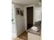 Bathroom with granite countertops, modern fixtures, and access to a closet for extra storage at 18211 N Conestoga Dr, Sun City, AZ 85373