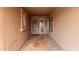 Covered entryway with tiled flooring and a view of the front door at 18211 N Conestoga Dr, Sun City, AZ 85373