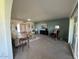 Spacious living room featuring neutral tones, ample seating, and large windows for natural light at 18211 N Conestoga Dr, Sun City, AZ 85373