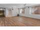 Finished basement space with wood-look floors, movie projector, and speakers for entertainment at 19412 N 77Th Ave, Glendale, AZ 85308
