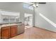 A kitchen with stainless steel appliances, sink and dishwasher. Includes tile flooring and a window at 19412 N 77Th Ave, Glendale, AZ 85308