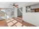 A sun room with tile flooring, large windows, and direct access to the outdoor patio at 19412 N 77Th Ave, Glendale, AZ 85308
