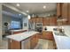 Well-lit kitchen with stainless steel appliances, white countertops, and lots of cabinet space at 19475 N Grayhawk Dr # 1046, Scottsdale, AZ 85255